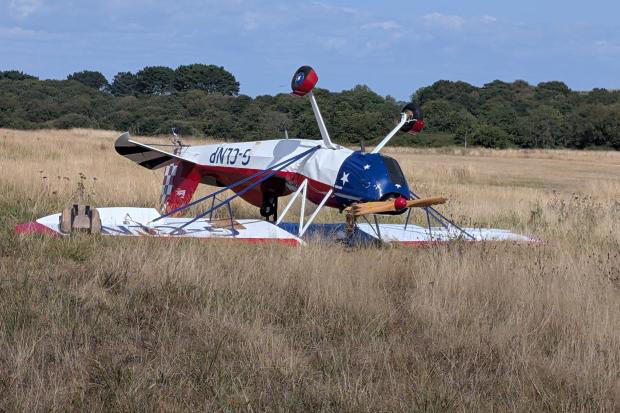 Plane flipped onto its back after landing went wrong at Isle of Wight ...