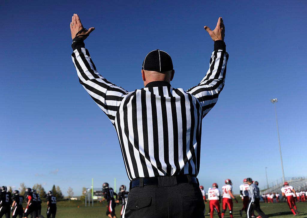 High school football referee suspended for grabbing a player and acting ...