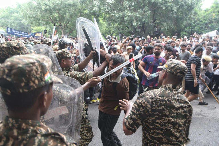 Indian police block 'Cockroach' rally, detain thousands in New Delhi