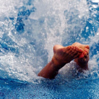 Young man severely injured after jumping from height into pool