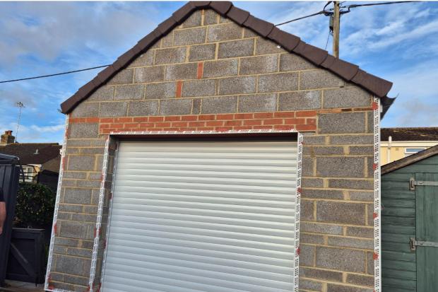 Homeowner builds garage higher than permitted without planning permission
