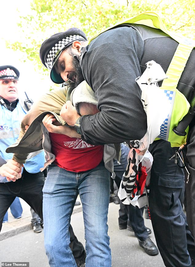 Communist pro-Palestine protesters arrested after climbing on Battle of ...