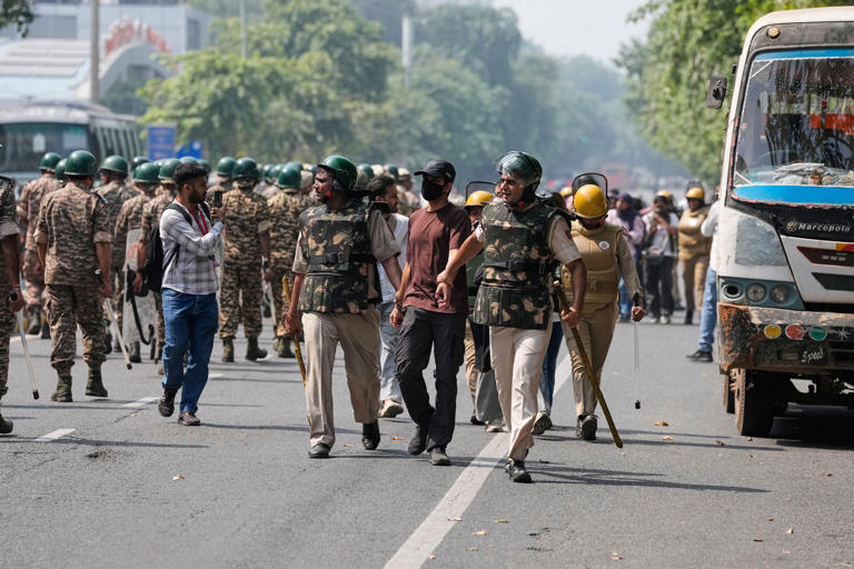 On the ground in Delhi under siege as protests rattle Modi government