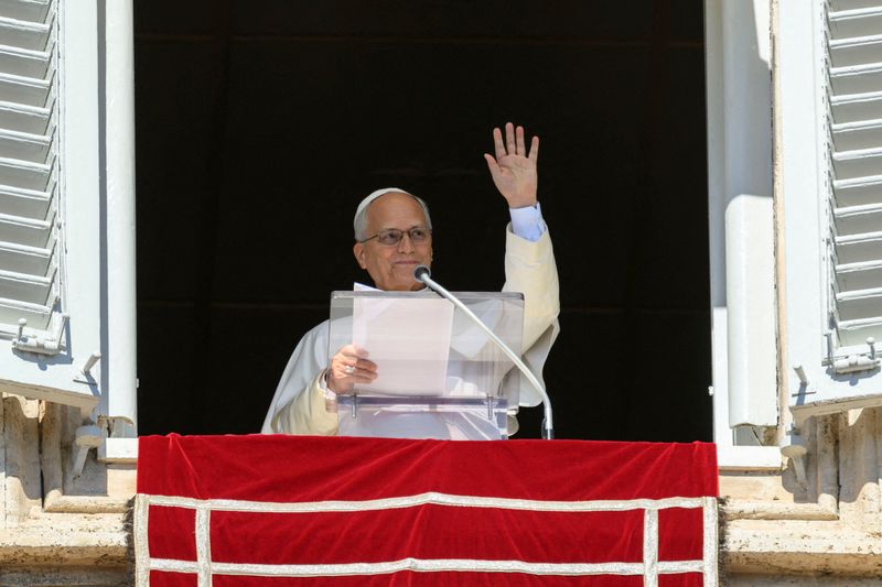 Pope Leo leads the Angelus prayer from the window of the Apostolic Palace at the Vatican, October 11, 2026. Vatican Media/Elisabetta Trevisan/­Handout via REUTERS