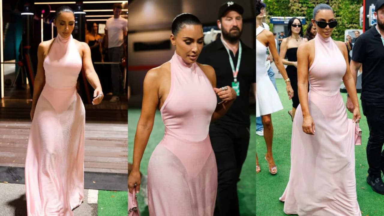 Kim Kardashian cheers on Lewis Hamilton in a baby pink leotard and ...