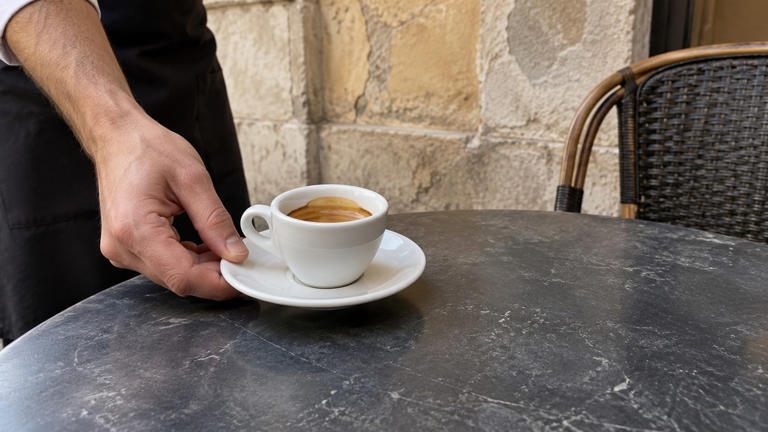 Why can the same coffee cost more at a table in Italy?