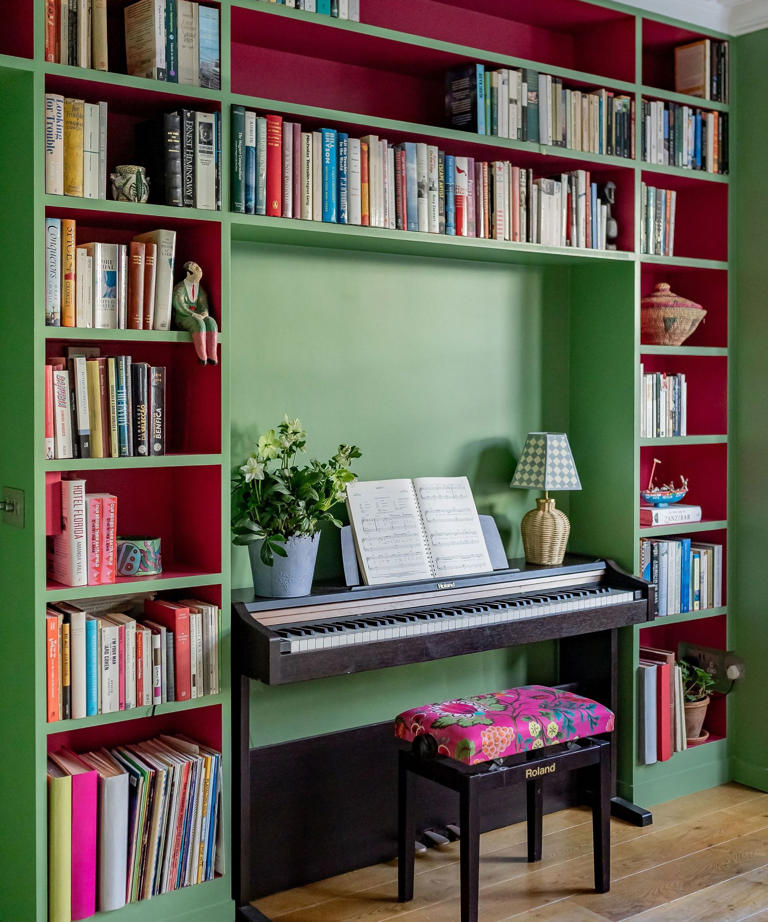 The designer shelving trend giving white built-ins a colorful makeover