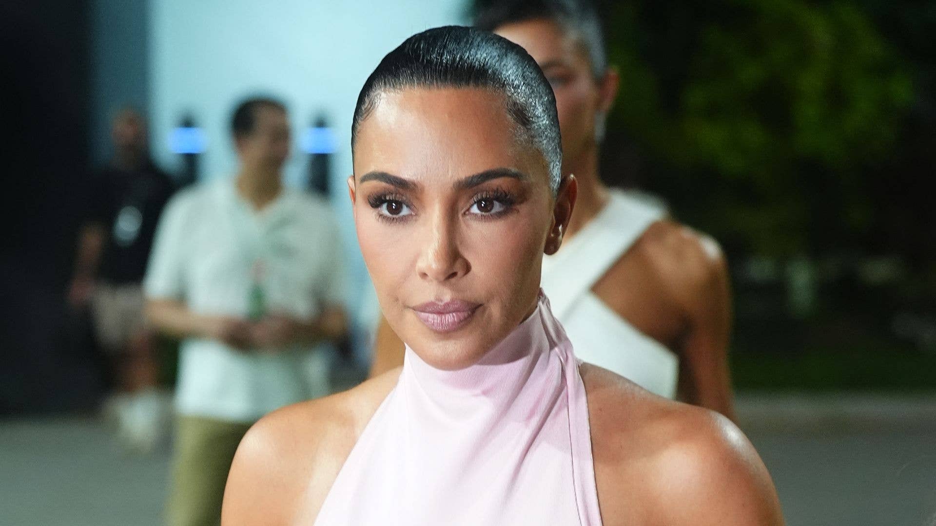 Kim Kardashian, 45, stuns in sheer pink dress as she supports Lewis ...
