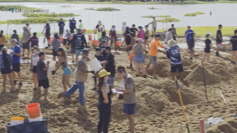 Volunteers help clear storm damage at Salt Pond Beach Park