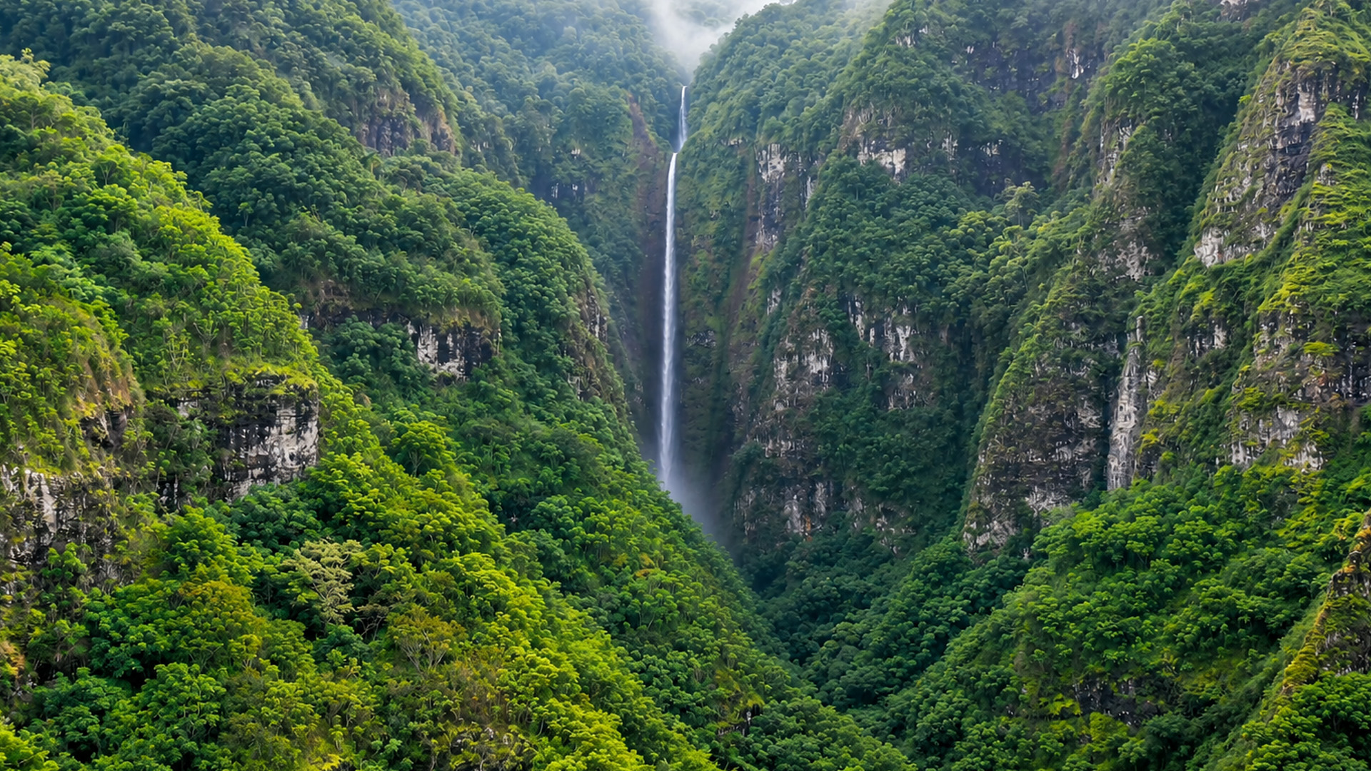 Steep cliffs surround this long ribbon of water