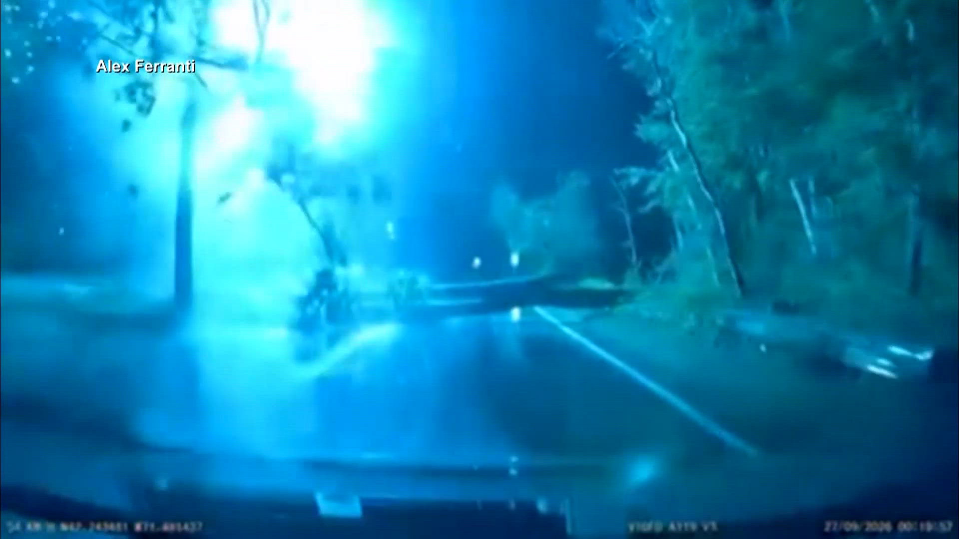 Dashcam video shows tree fall onto transformer, crash down in front of car