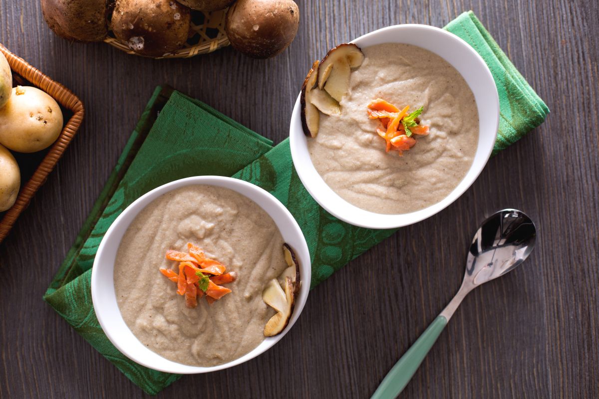 Cream of porcini mushrooms with crispy salmon julienne