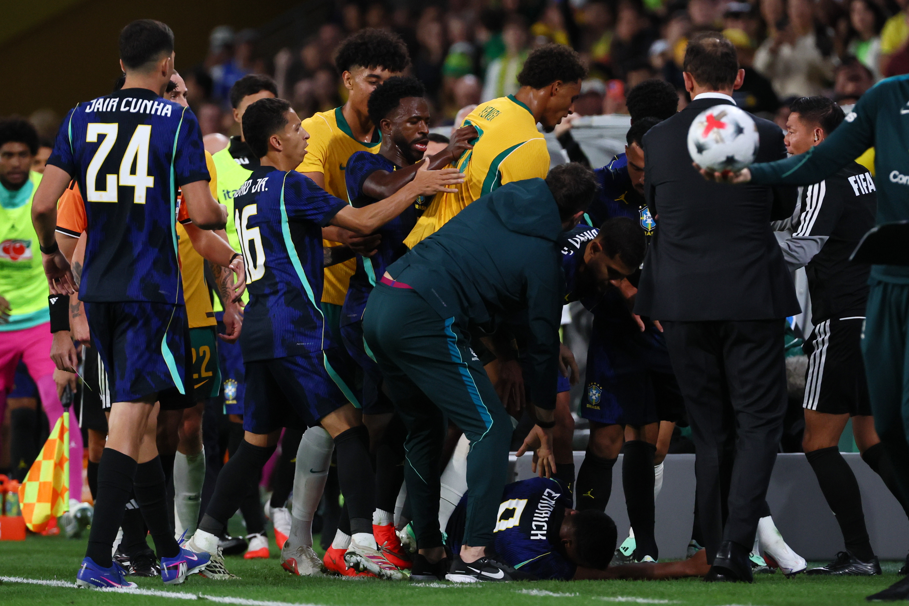 Players scuffle on the side lines during the international friendly soccer match between Australia and Brazil in Brisbane, Australia, on Tuesday, Sept. 29, 2026. (AP Photo/Tertius Pickard)
