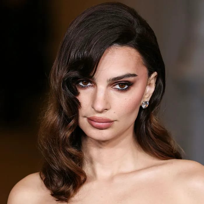 Iconic: Emily Ratajkowski turns heads in a red and black maxi dress at ...