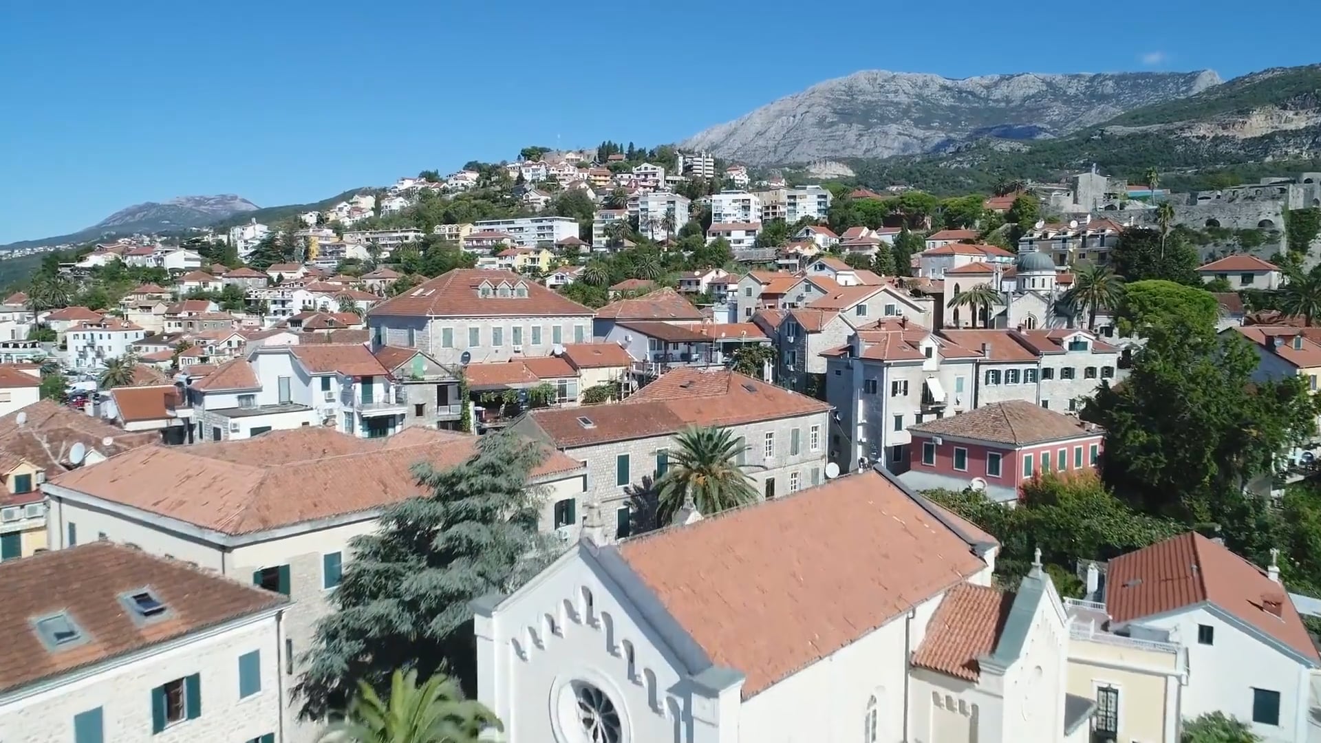 Drone flies through terraced hills in Herceg Novi, Montenegro