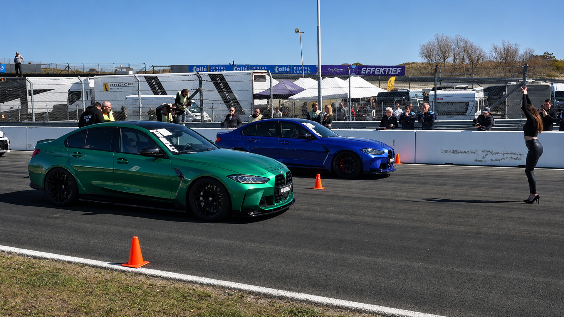 Modified performance cars unleash their power in a drag race