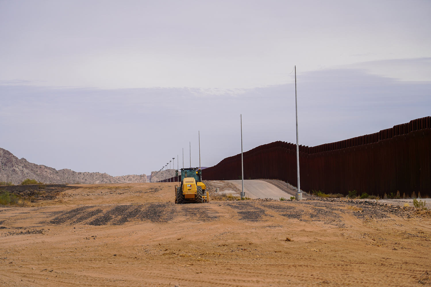 Trump’s border wall construction cut into an ancient ground carving ...
