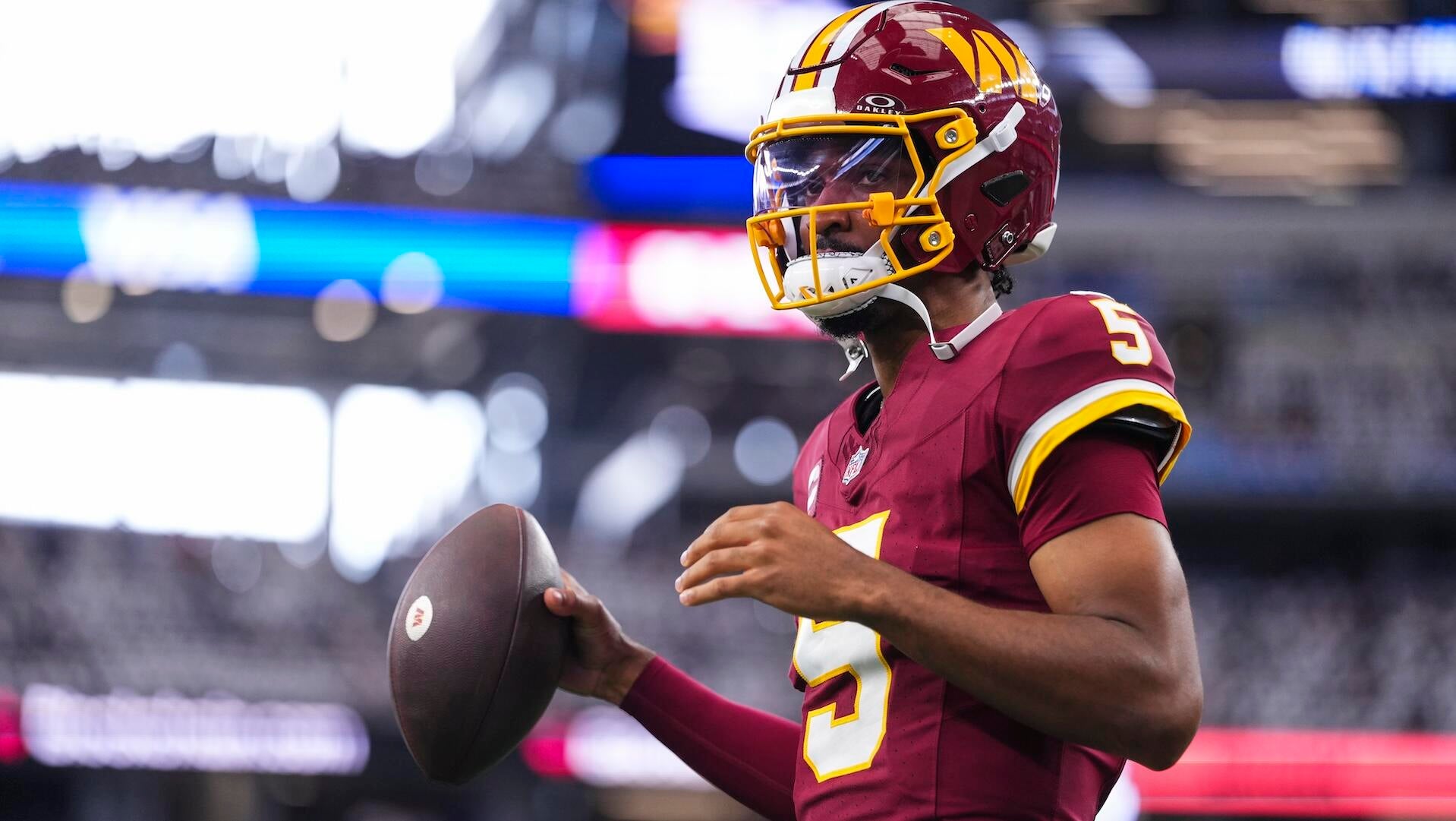 Commanders' Jayden Daniels opting against elbow surgery until after ...