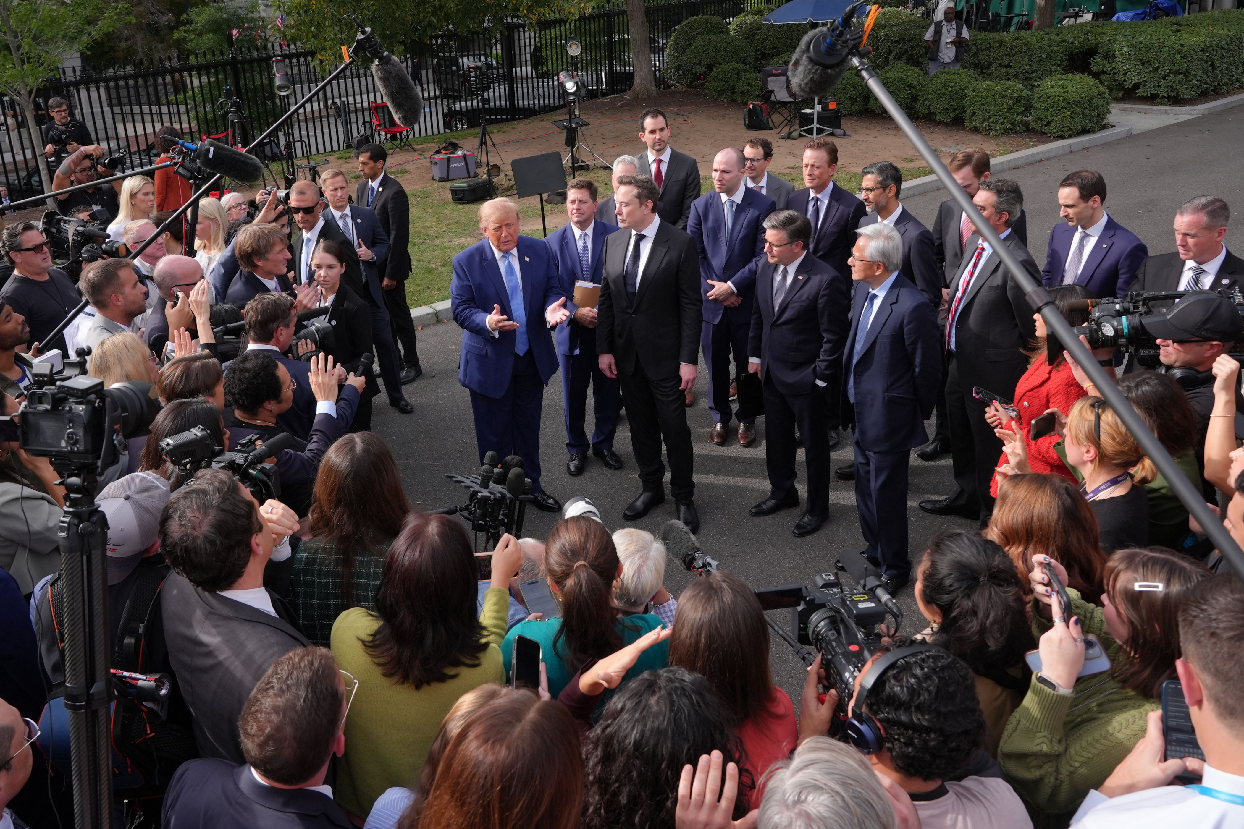 Trump, top tech firms sign accord to 'self-police' AI development