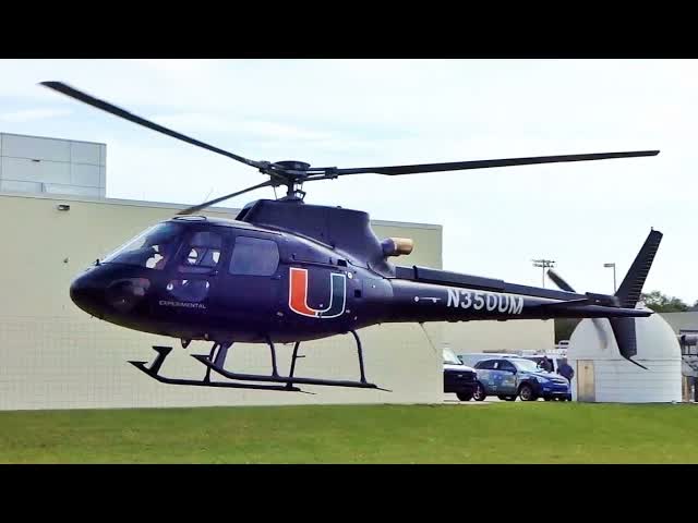 Eurocopter AS-350 takes off from university campus