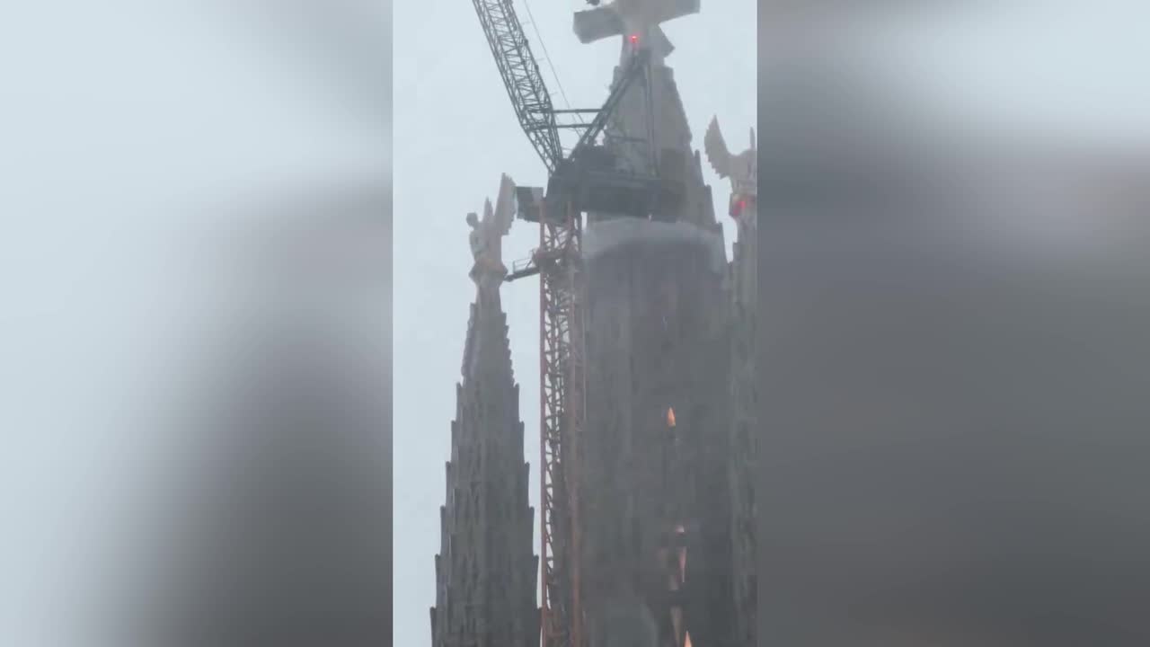Sagrada Família vanishes into heavy rain and mist as autumn storm hits ...