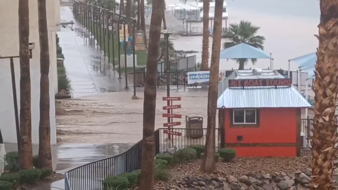 Flash floods turn Laughlin walkway into muddy river as Colorado River ...
