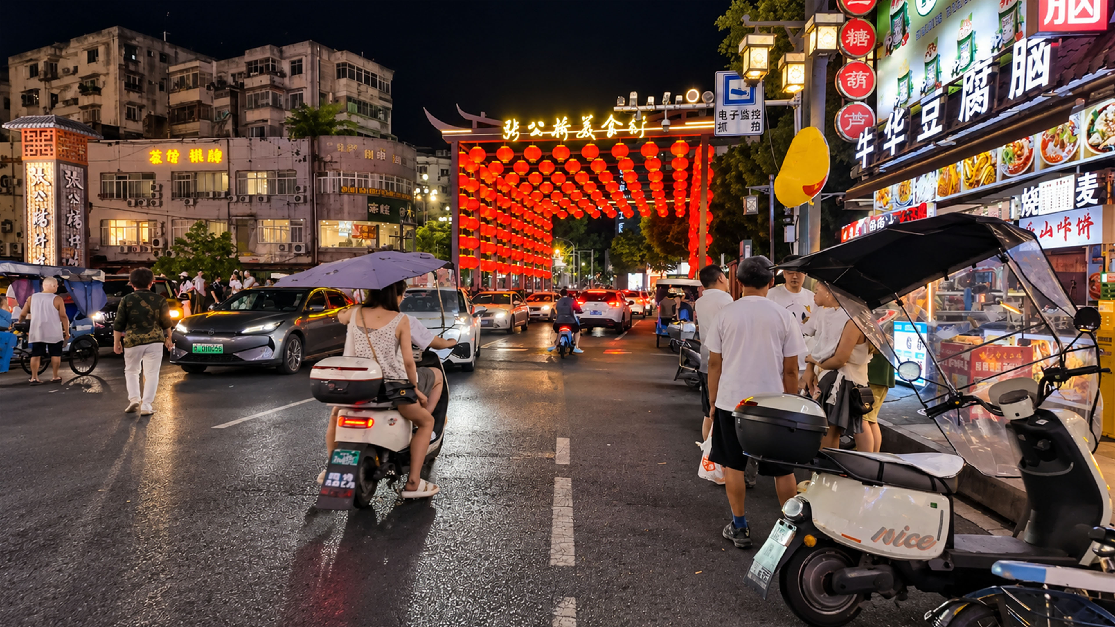A glowing lantern gateway transforms this busy China street