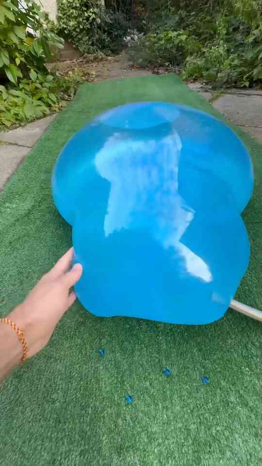 Pushing inflatable toys until they cannot take more