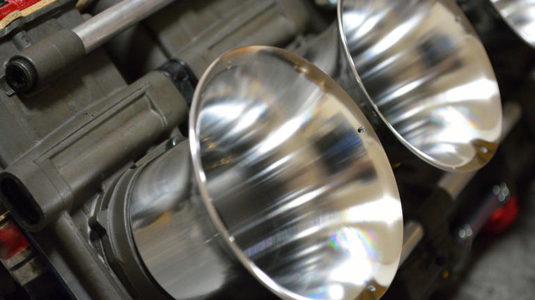 What do velocity stacks do on a motorcycle?