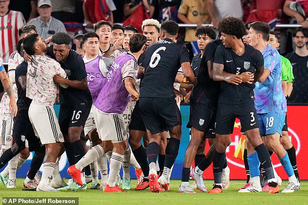 Benches cleared as substitutes from both teams entered the field and got involved in the melee