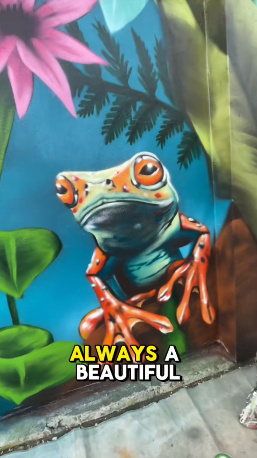 Artist reveals a stunning nature mural transformation in a garden space