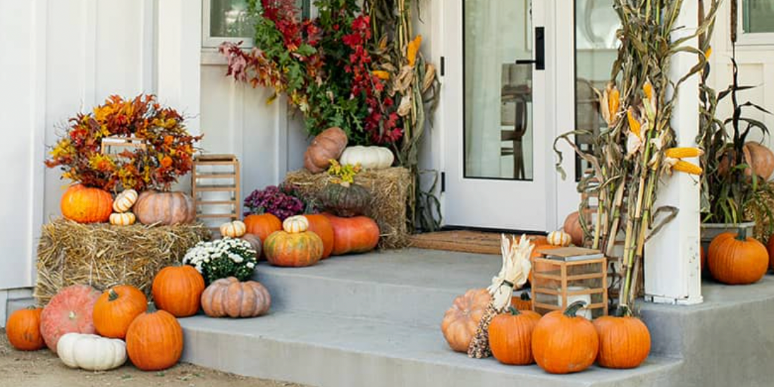 Go ahead and buy more pumpkins—you’ll want them for these fall porch ideas