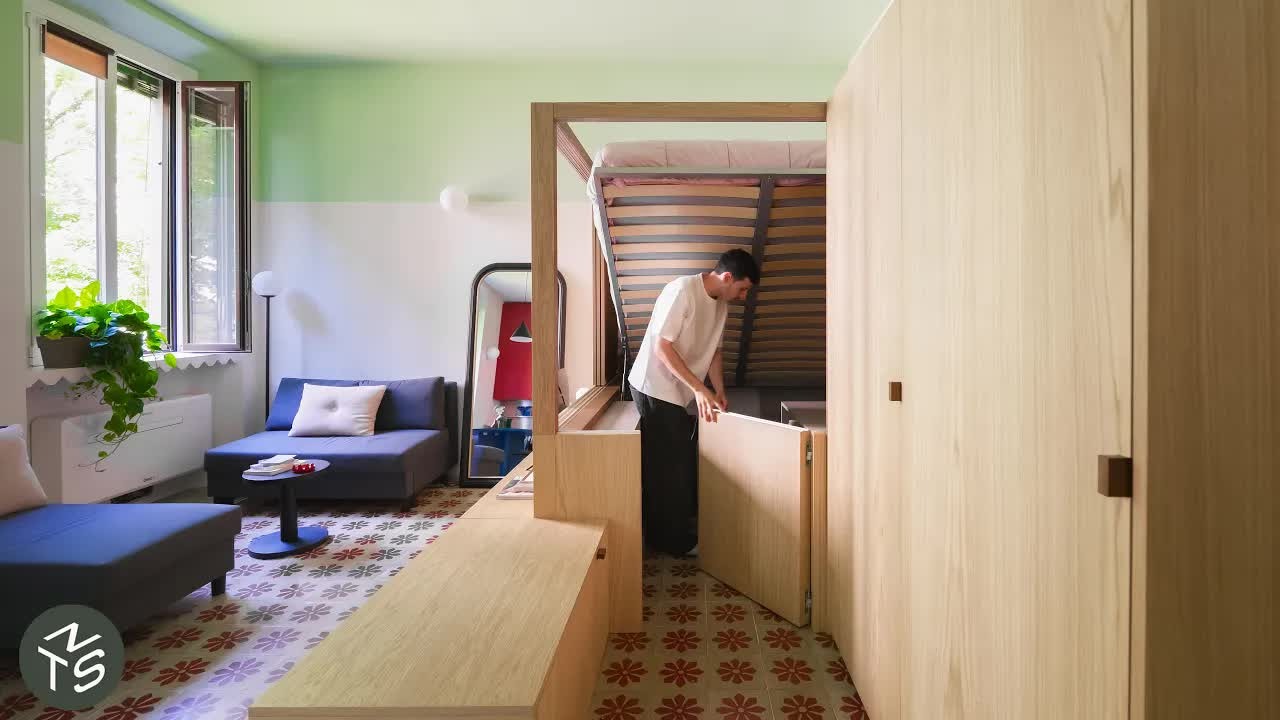 A couple lives in this 301-sqft Milan apartment... their walk-in closet ...