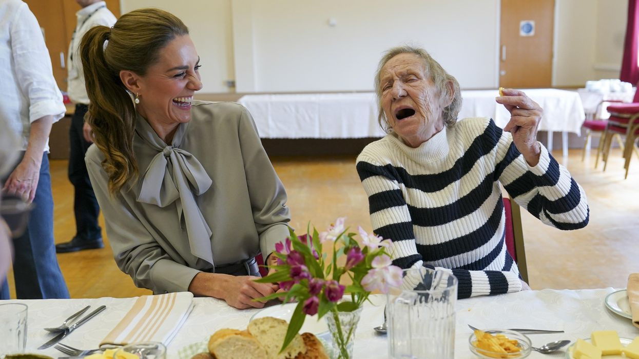 Crisps and kerb-jumping as Kate joins village hall group for lunch