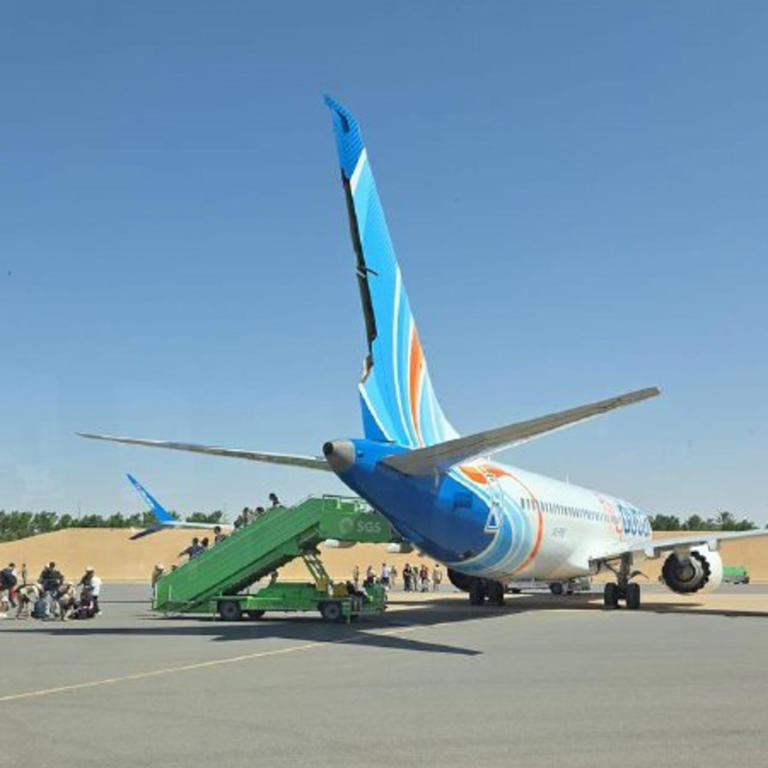 The FlyDubai plane that nearly crashed, with damage to its tail.