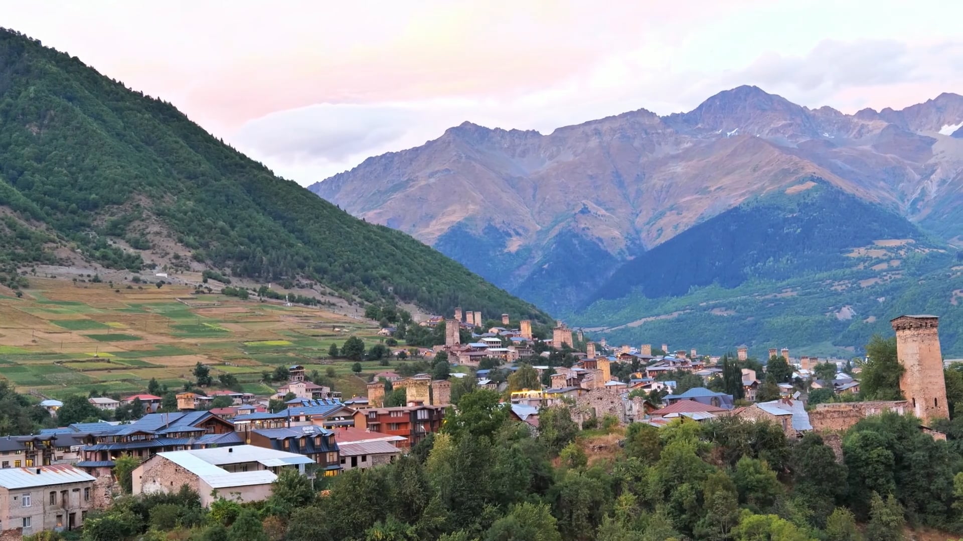 Drone soars over mountain towers in Svaneti, Georgia