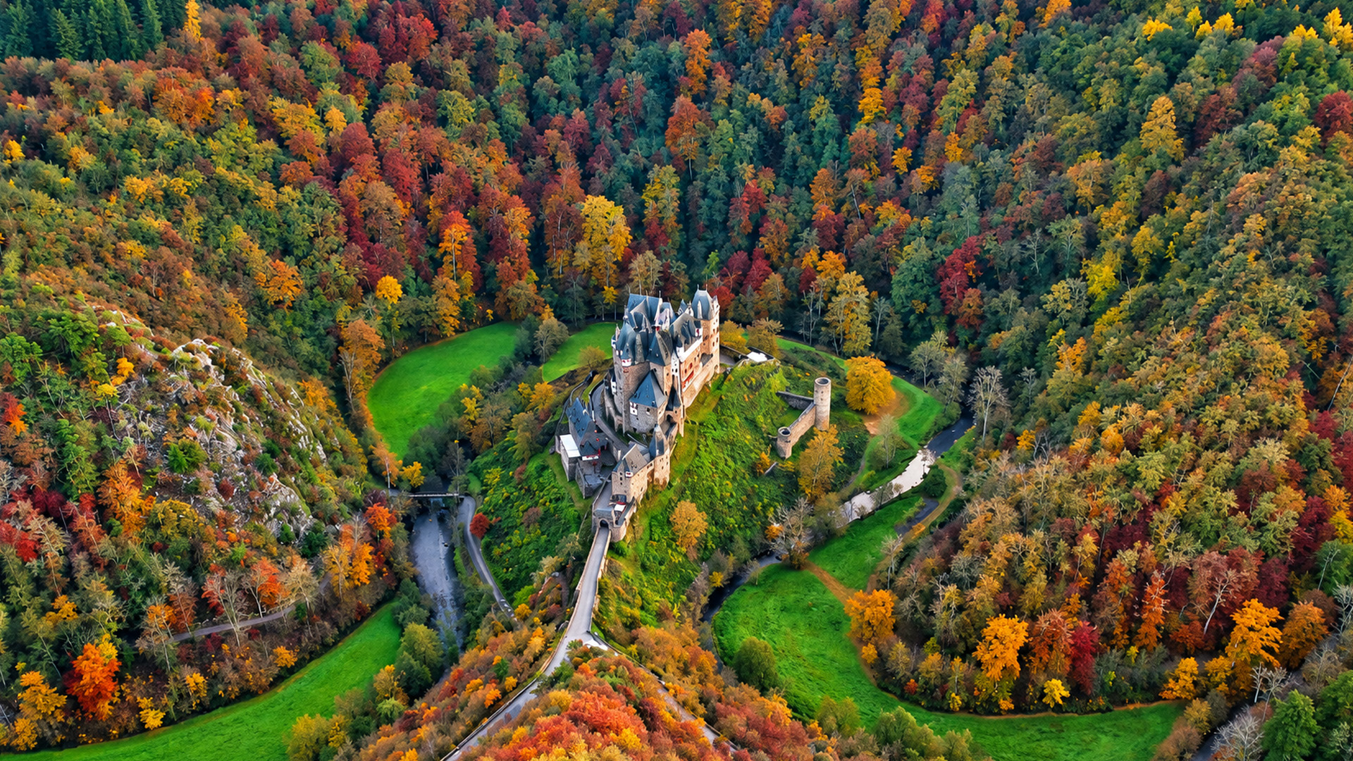 medieval-eltz-castle-surrounded-by-autumn-forest