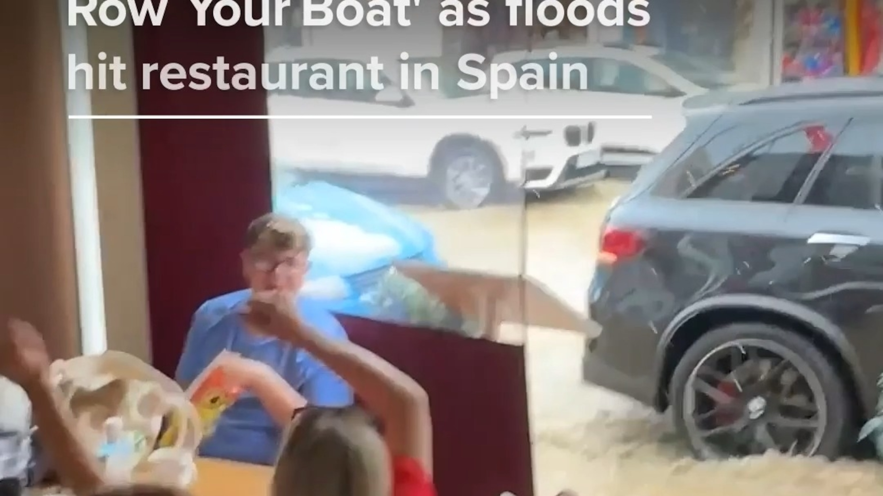 Group sings 'Row, row, row your boat' as floods hit restaurant in Spain