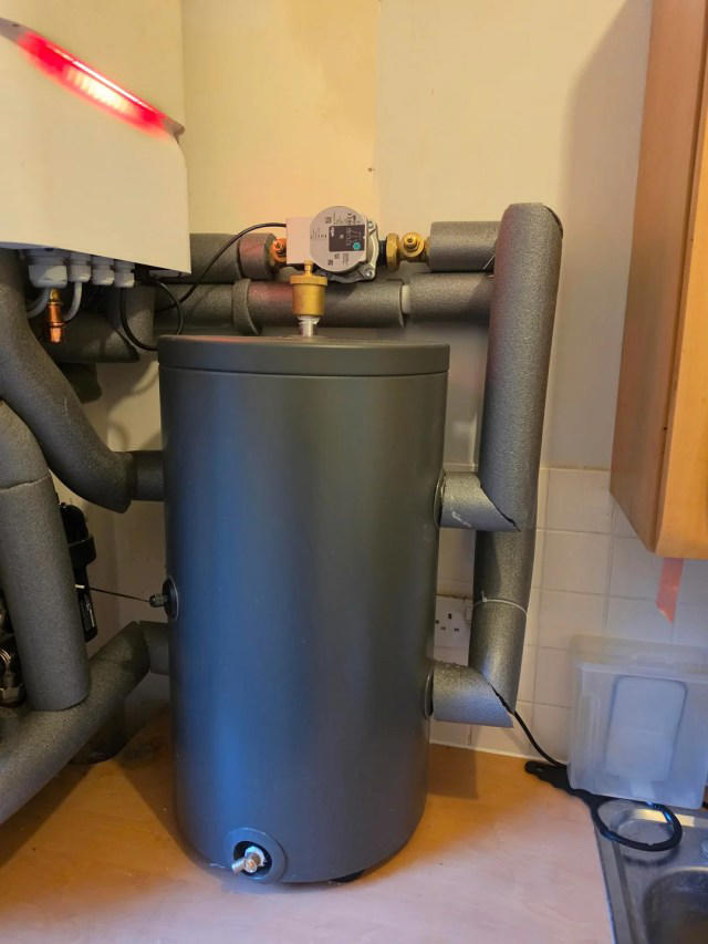 UK homeowner says heat pump install left a buffer tank on the kitchen ...