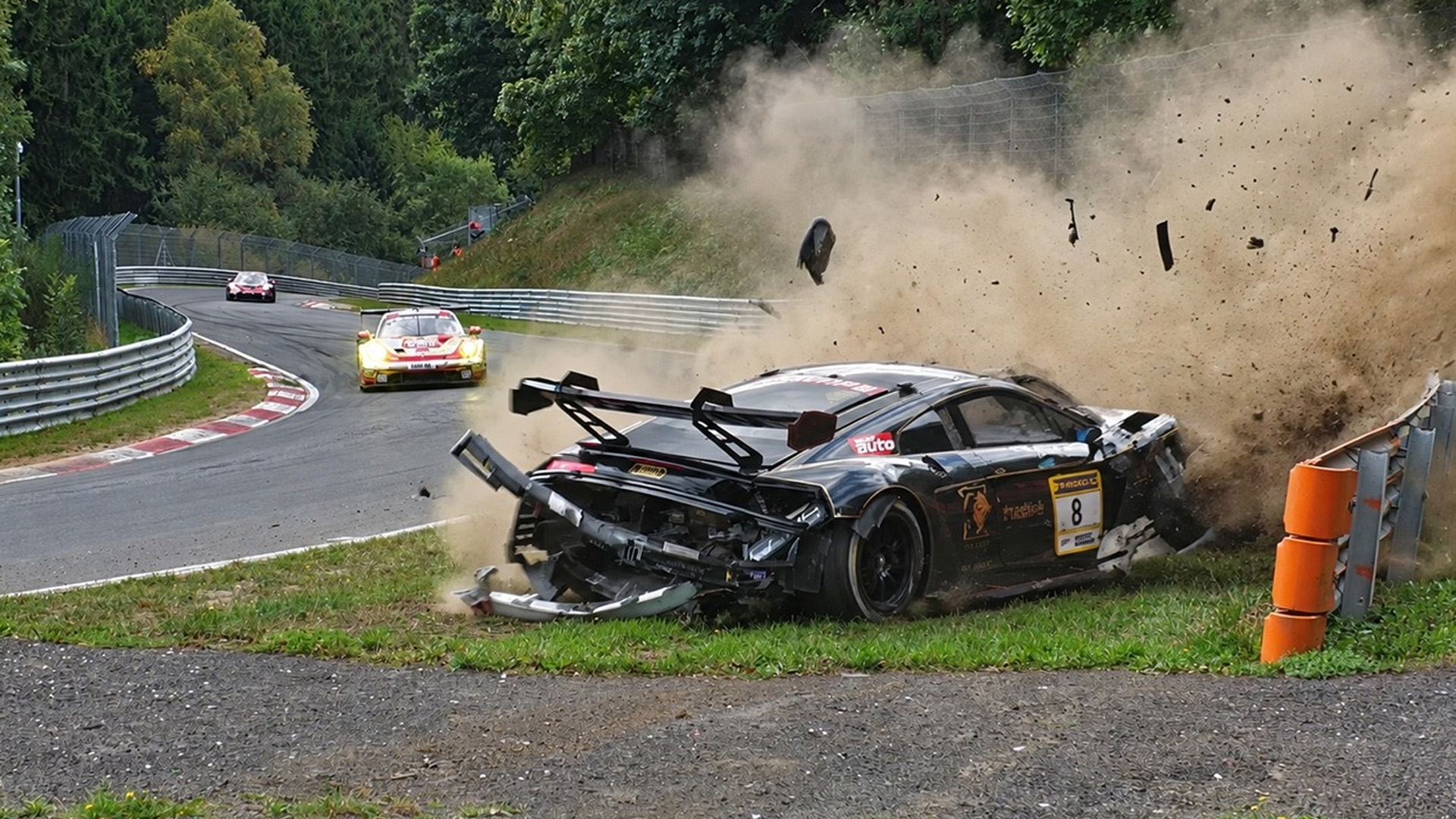 Audi GT3 race car hits the barrier during a fast Nürburgring run