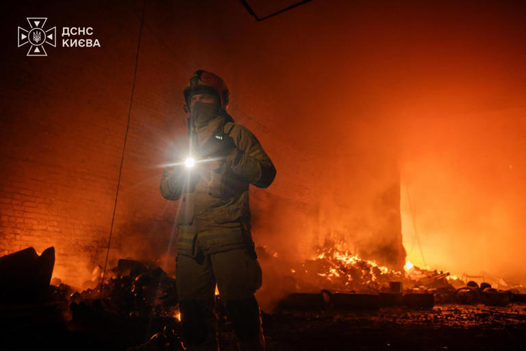 Kyiv hit by overnight Russian attack: High-rise and warehouse catch ...