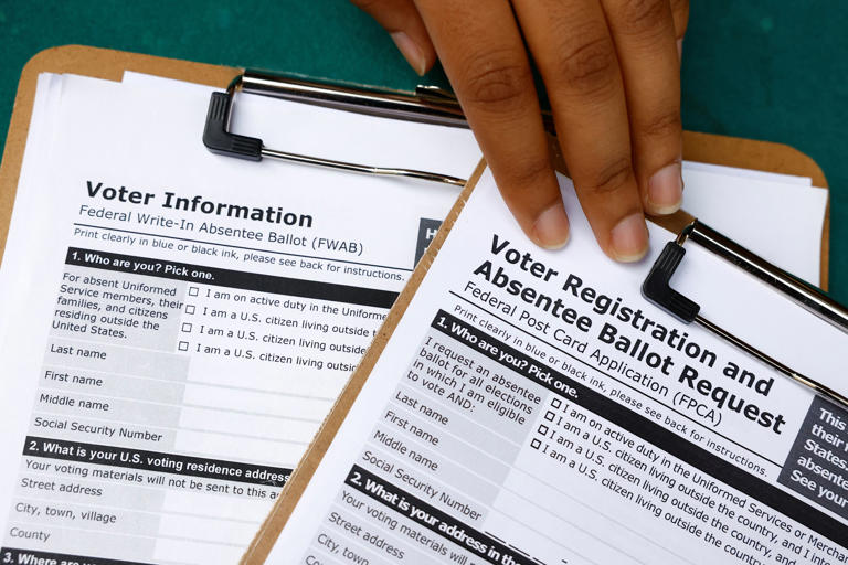 Democrats sue over Pentagon's changes to voter forms for Americans overseas