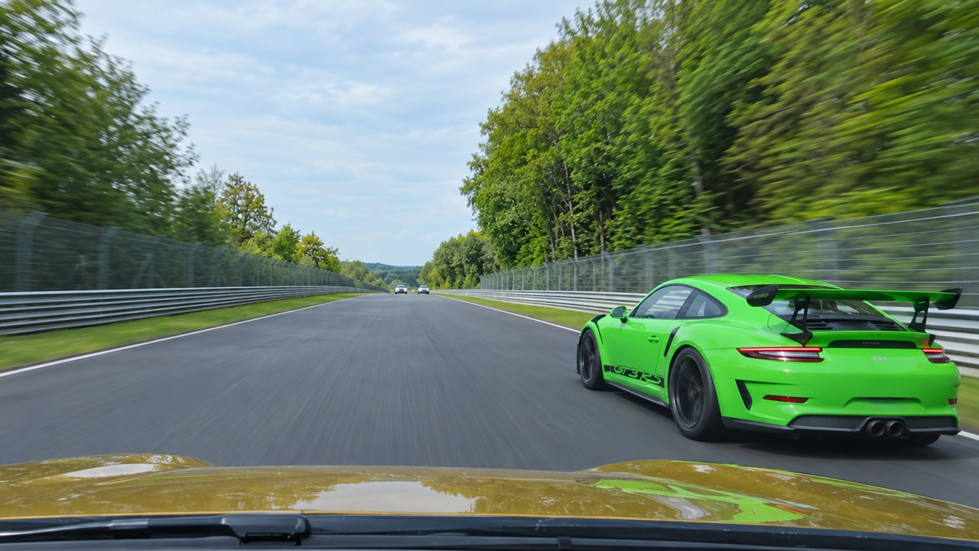Porsche 911 GT3 RS surges past on a fast Nürburgring straight
