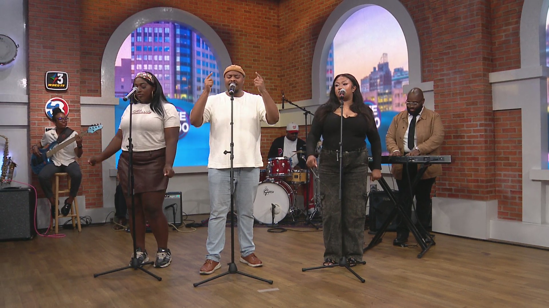 Dedrick performs with band on Live at 9!