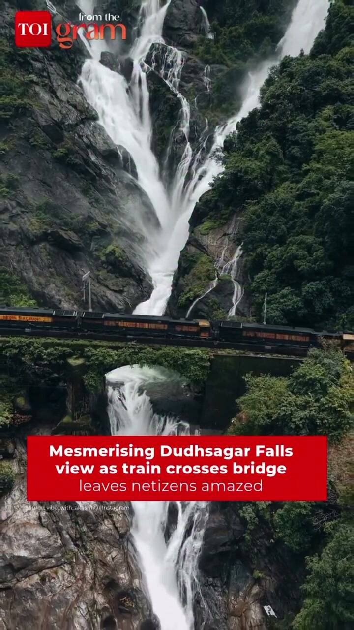 Train passes over Dudhsagar Falls in stunning visual