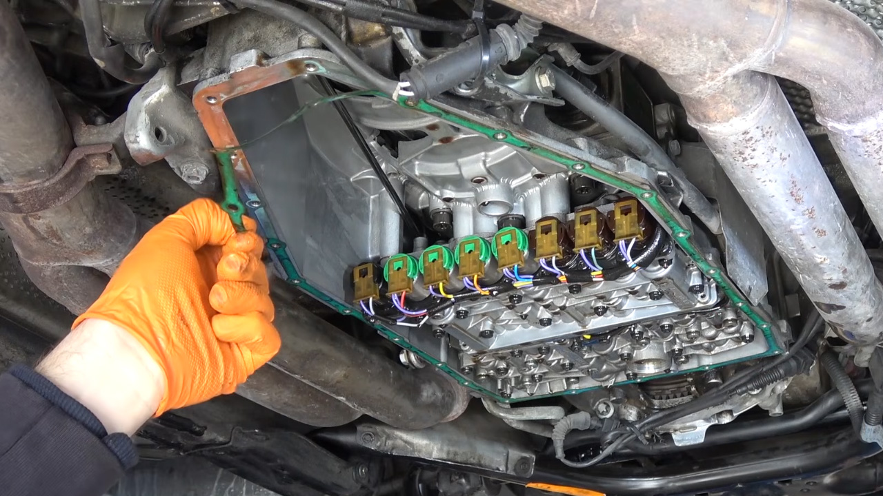 Fixing a random mysterious engine noise in an old BMW E38 750iL