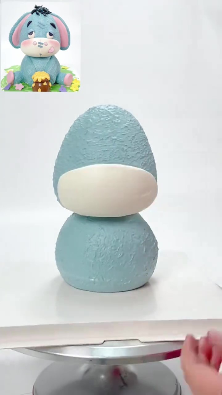 Adorable blue donkey cake comes to life as a cute 3D character