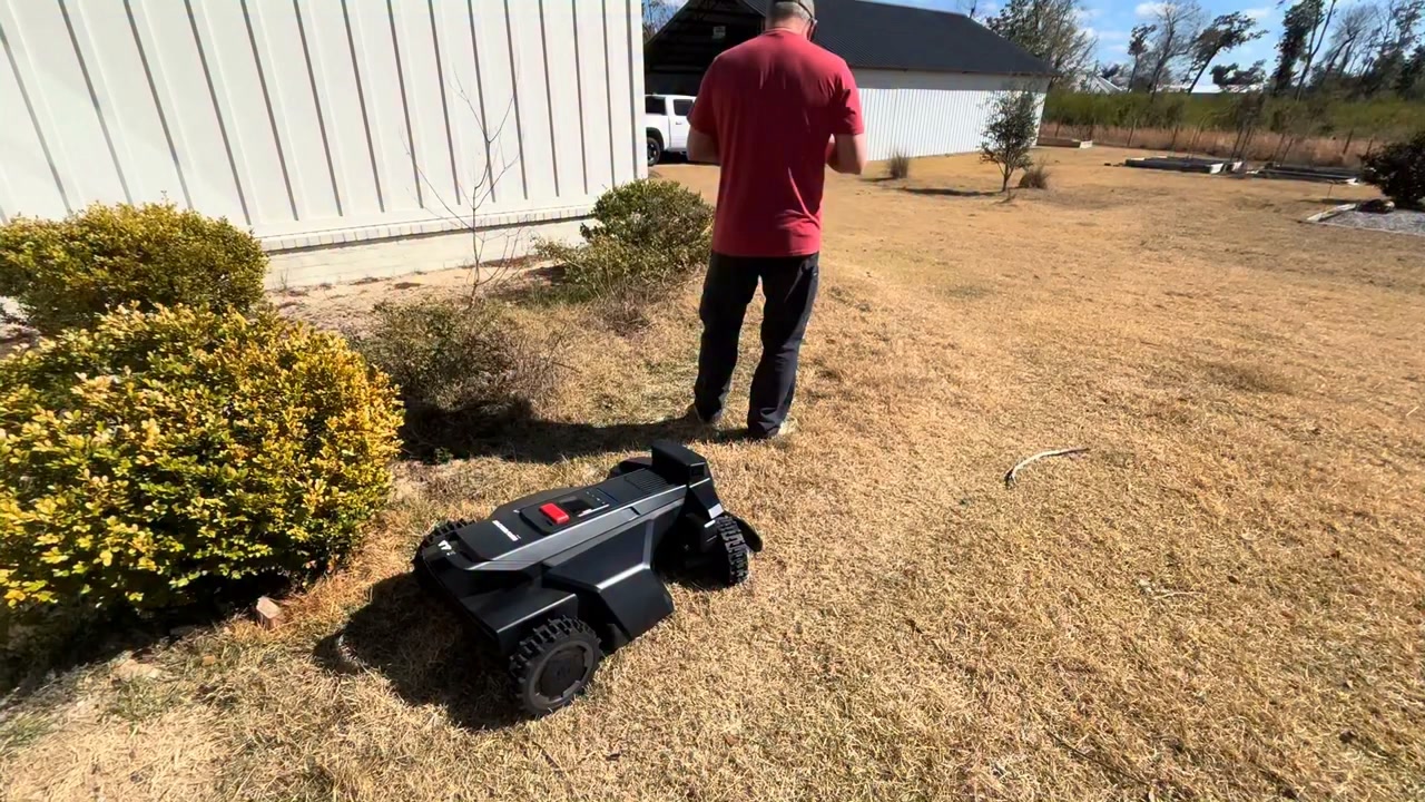 New robotic lawn mower in use