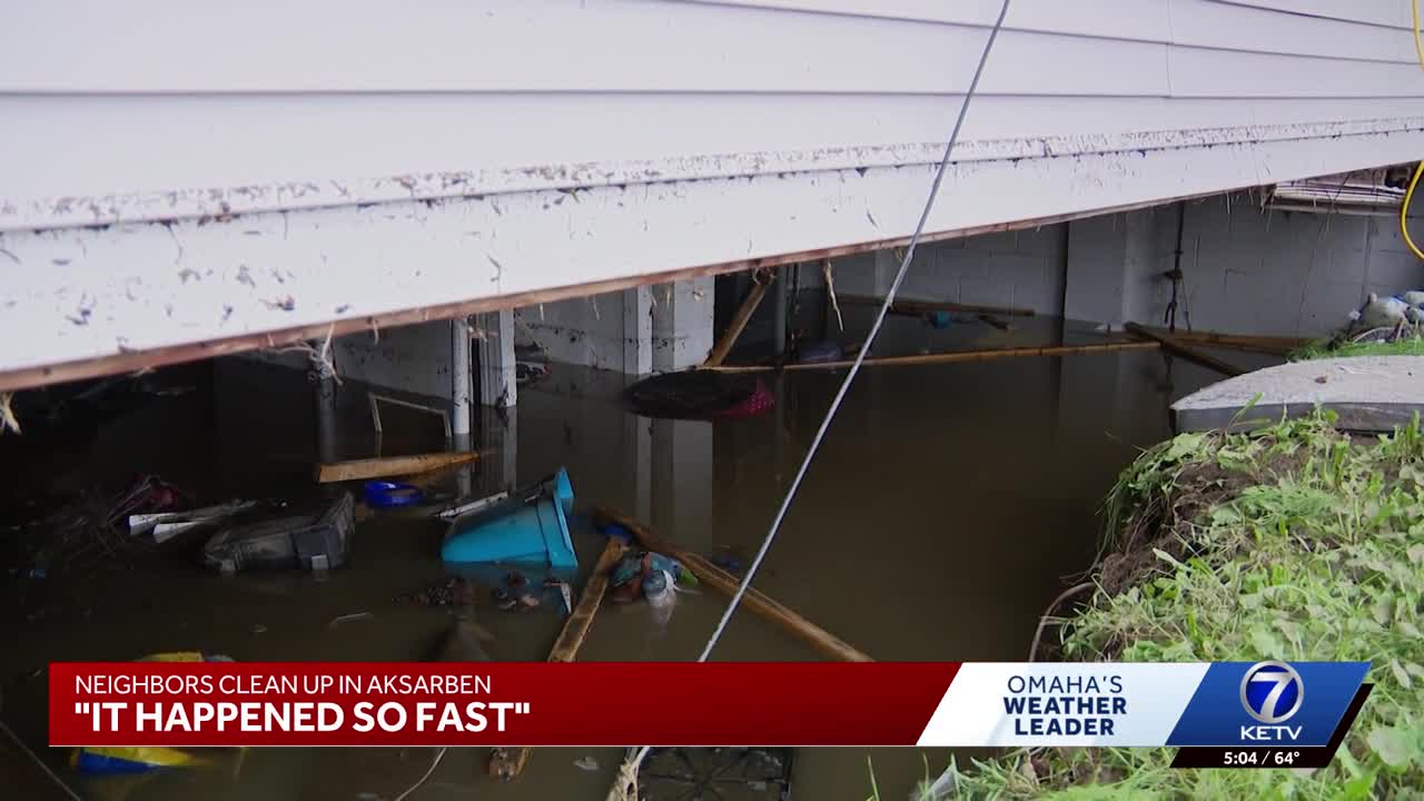 Aksarben area neighbors pump water out of basements, garages