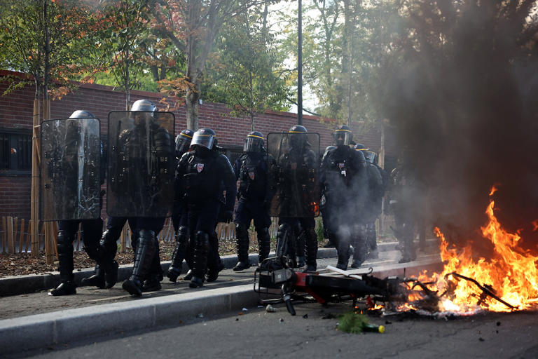 Schools set on fire in France as student riots dramatically escalate